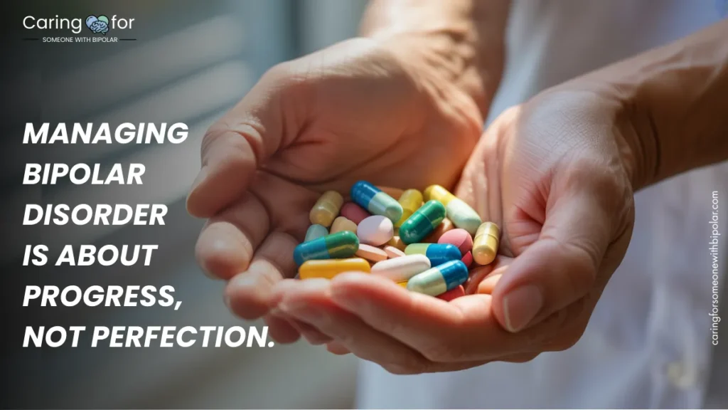 Close-up of hands holding colorful pills with overlay text: “Managing bipolar disorder is about progress, not perfection.”